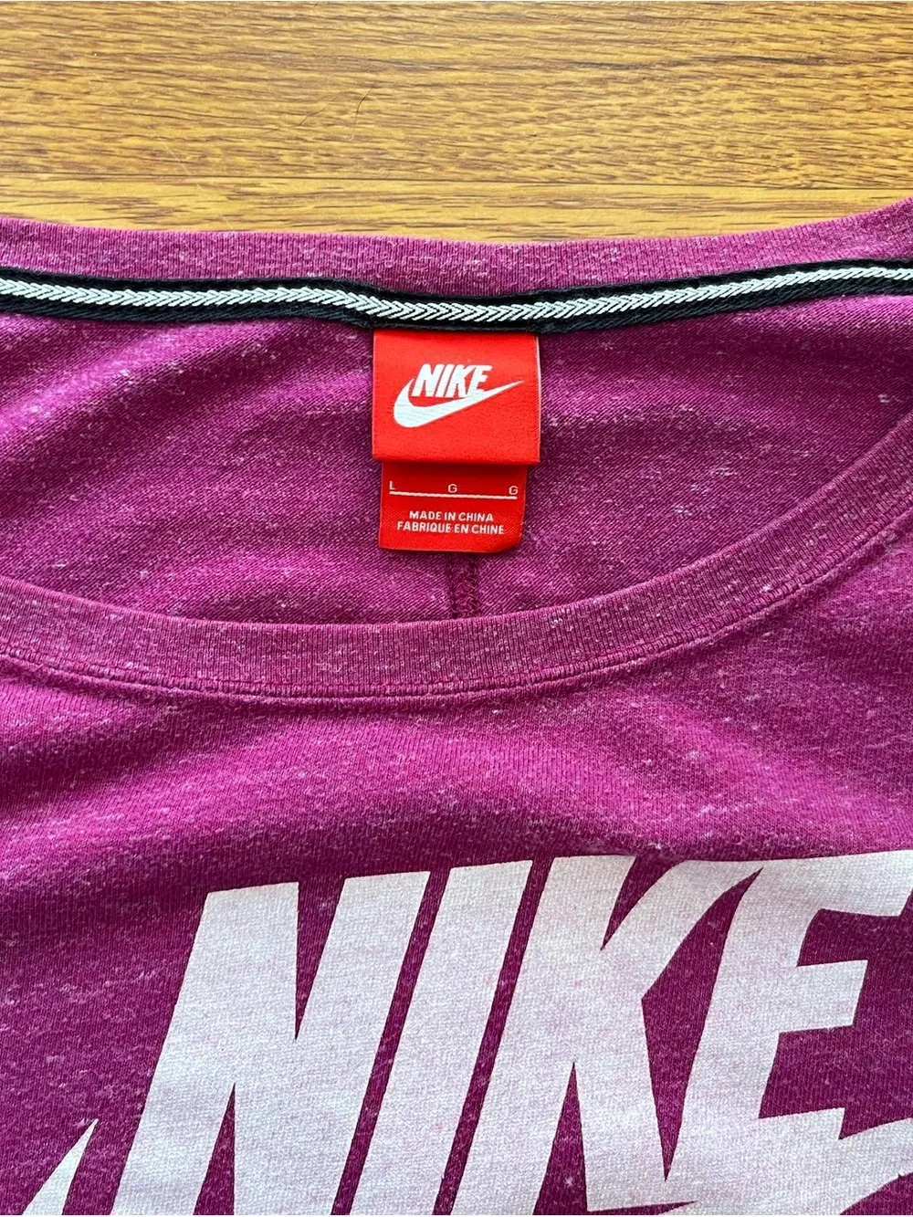 Nike Women's Scoop-Neck lightweight off shoulder pullover top in Magenta